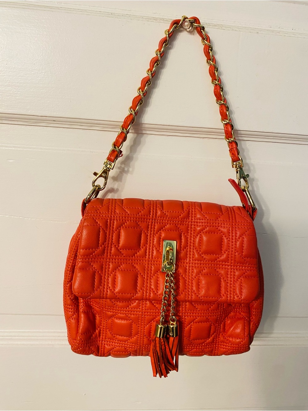 Stylish Orange Quilted Clutch with Braided Gold Chain Strap